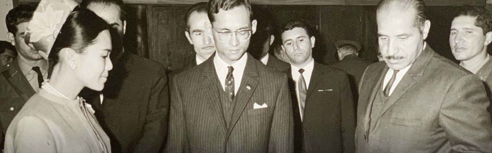 black and white photo of owner with his colleagues